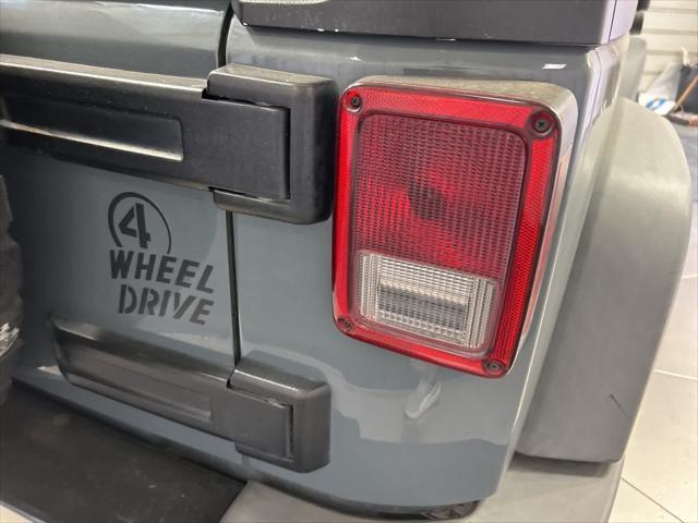 used 2014 Jeep Wrangler car, priced at $13,999