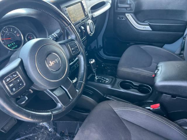 used 2015 Jeep Wrangler Unlimited car, priced at $20,698