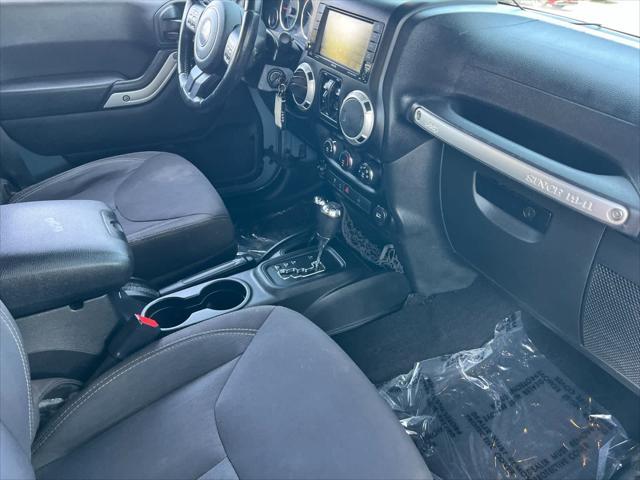 used 2015 Jeep Wrangler Unlimited car, priced at $20,698