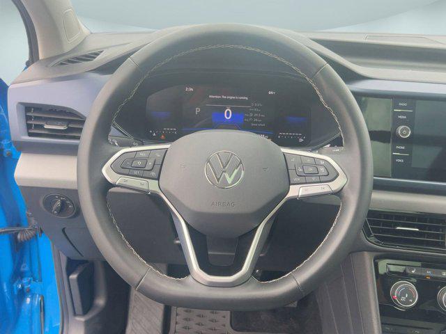 used 2023 Volkswagen Taos car, priced at $19,998