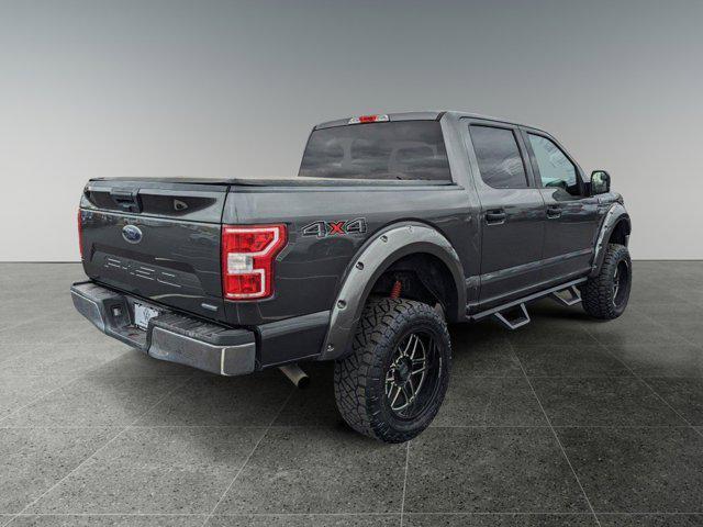 used 2018 Ford F-150 car, priced at $25,596