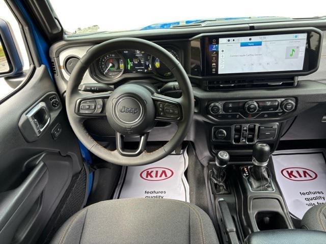 used 2024 Jeep Wrangler 4xe car, priced at $31,202