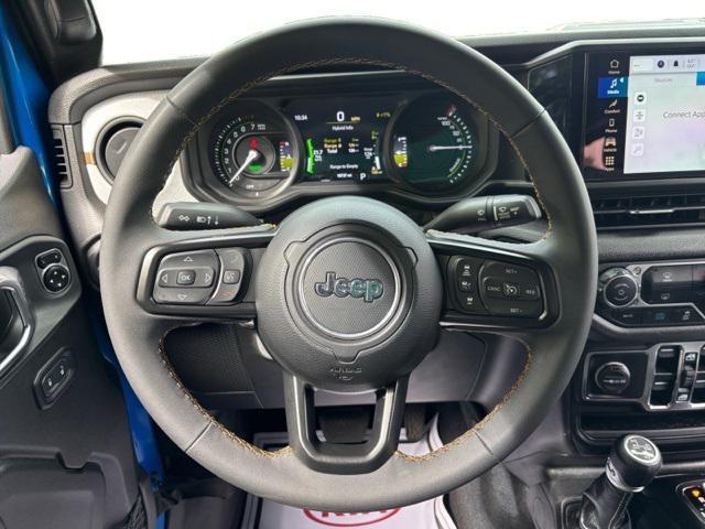used 2024 Jeep Wrangler 4xe car, priced at $31,202