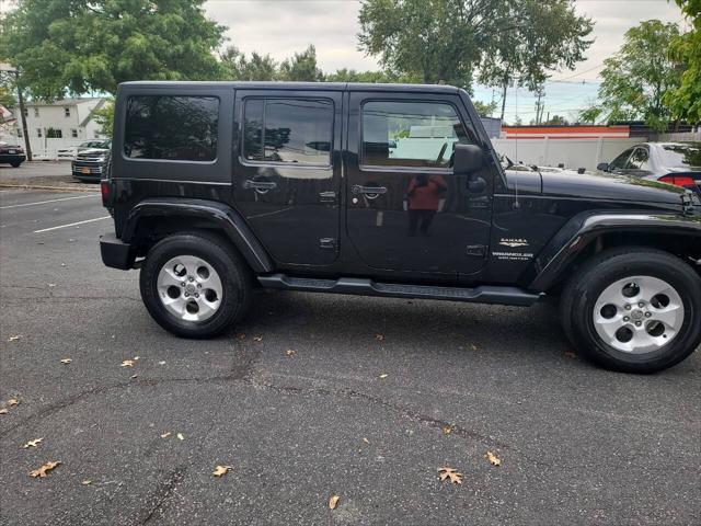 used 2014 Jeep Wrangler Unlimited car, priced at $16,995