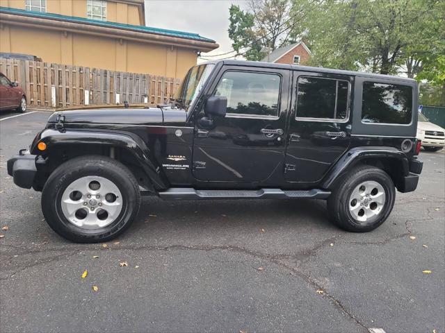 used 2014 Jeep Wrangler Unlimited car, priced at $16,995