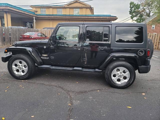 used 2014 Jeep Wrangler Unlimited car, priced at $16,995