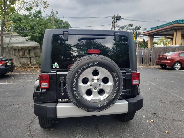 used 2014 Jeep Wrangler Unlimited car, priced at $16,995