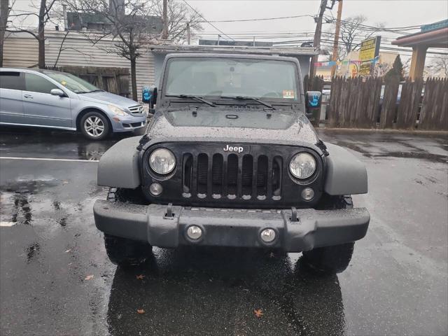 used 2015 Jeep Wrangler car, priced at $11,995