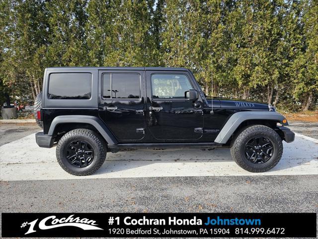 used 2016 Jeep Wrangler Unlimited car, priced at $14,239