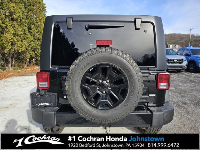 used 2016 Jeep Wrangler Unlimited car, priced at $14,239