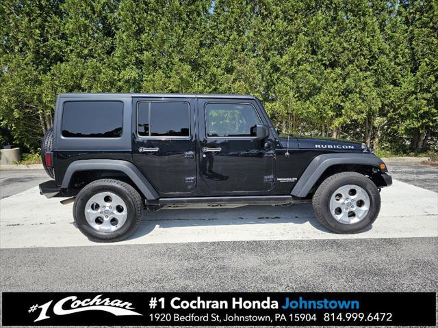 used 2015 Jeep Wrangler Unlimited car, priced at $21,455