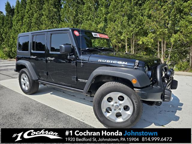 used 2015 Jeep Wrangler Unlimited car, priced at $21,455