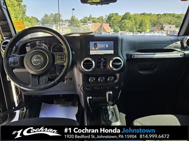 used 2015 Jeep Wrangler Unlimited car, priced at $21,455