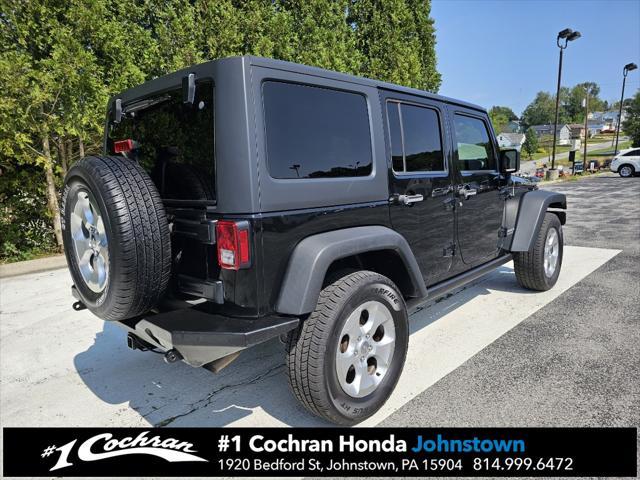 used 2015 Jeep Wrangler Unlimited car, priced at $21,455