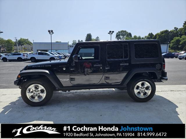 used 2015 Jeep Wrangler Unlimited car, priced at $21,455