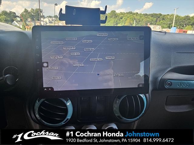 used 2015 Jeep Wrangler car, priced at $16,990