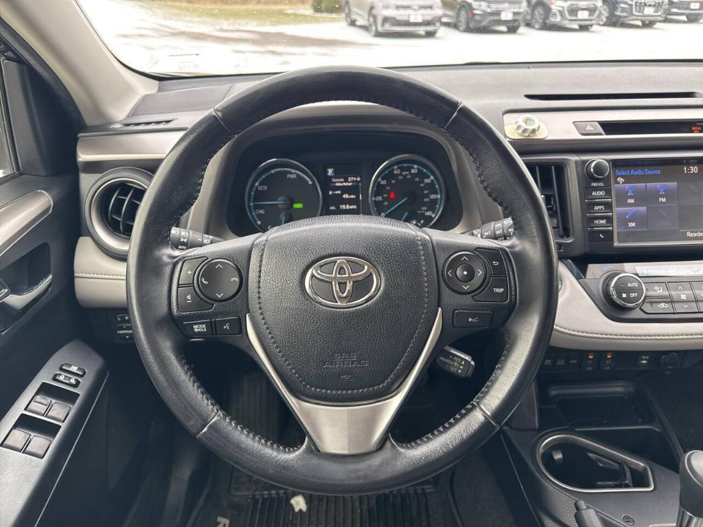 used 2018 Toyota RAV4 Hybrid car, priced at $24,995