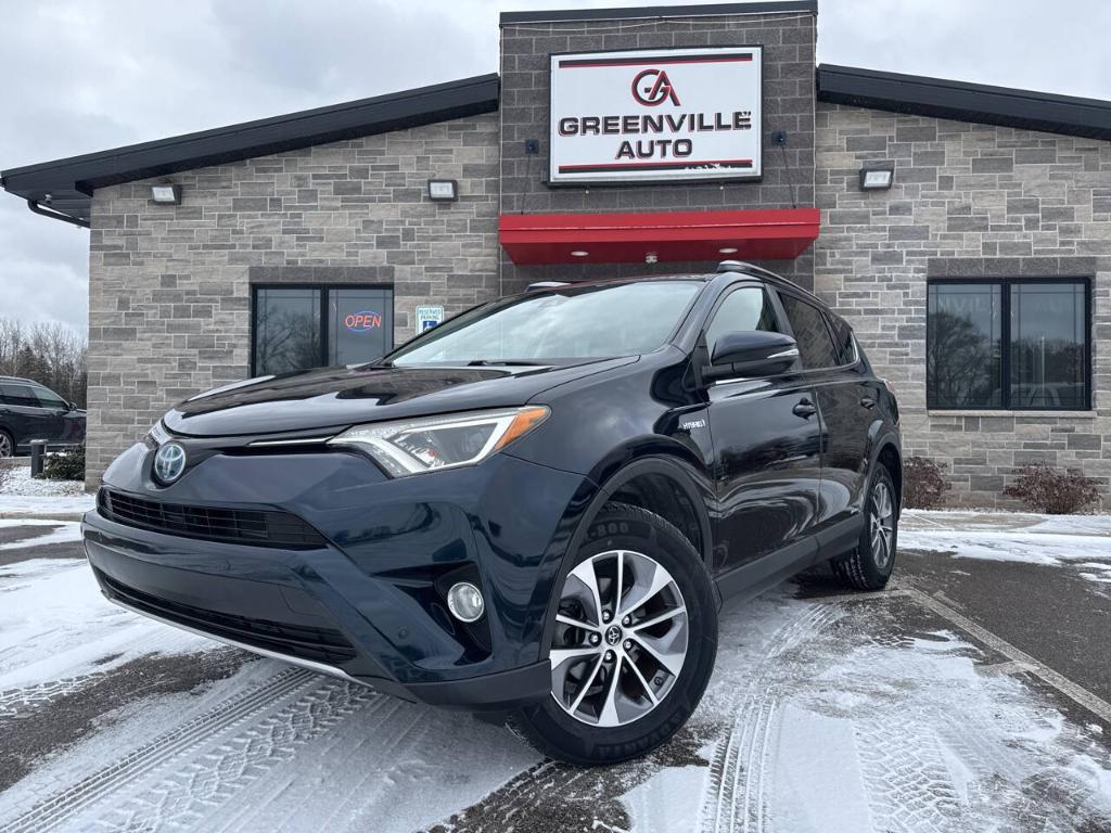 used 2018 Toyota RAV4 Hybrid car, priced at $24,995