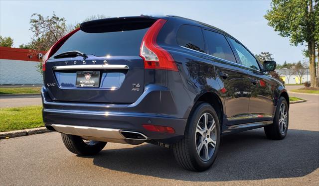 used 2015 Volvo XC60 car, priced at $16,988