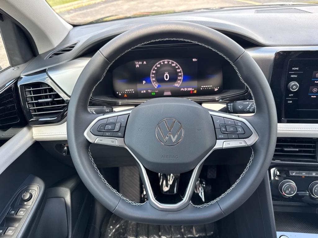 new 2025 Volkswagen Taos car, priced at $27,561