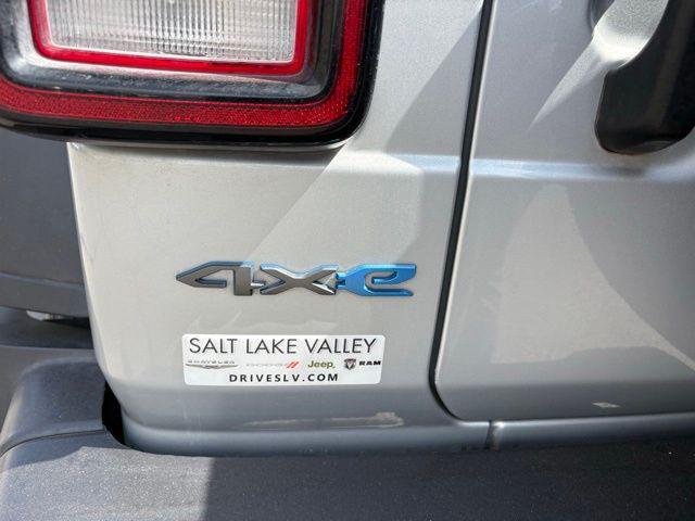 used 2023 Jeep Wrangler 4xe car, priced at $27,379