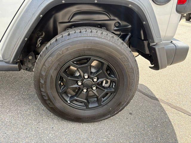 used 2023 Jeep Wrangler 4xe car, priced at $27,379