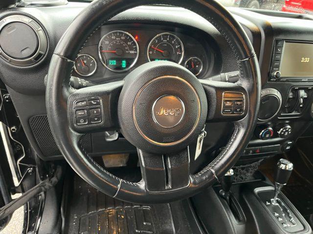 used 2015 Jeep Wrangler Unlimited car, priced at $20,999