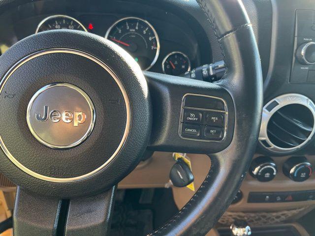 used 2014 Jeep Wrangler Unlimited car, priced at $25,799