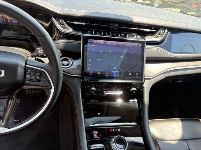 used 2023 Jeep Grand Cherokee 4xe car, priced at $27,544