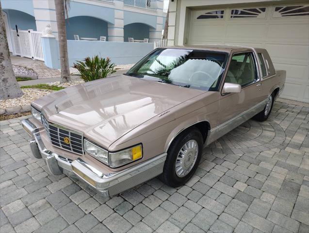 used 1991 Cadillac DeVille car, priced at $24,999
