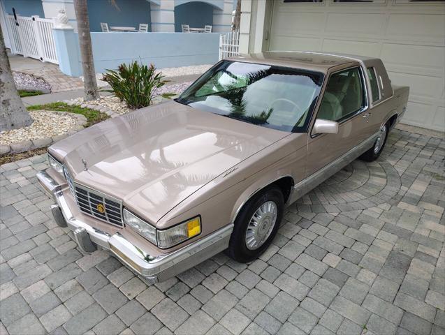 used 1991 Cadillac DeVille car, priced at $24,999