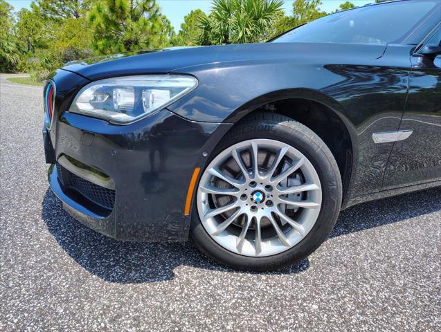 used 2015 BMW 750 car, priced at $18,999