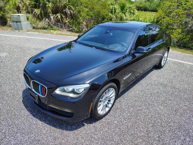 used 2015 BMW 750 car, priced at $18,999