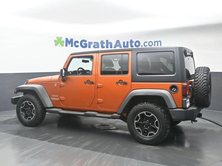 used 2011 Jeep Wrangler Unlimited car, priced at $14,998