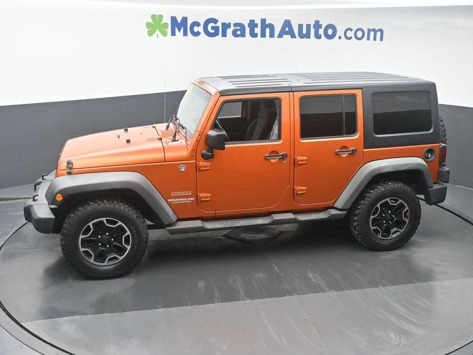 used 2011 Jeep Wrangler Unlimited car, priced at $14,998