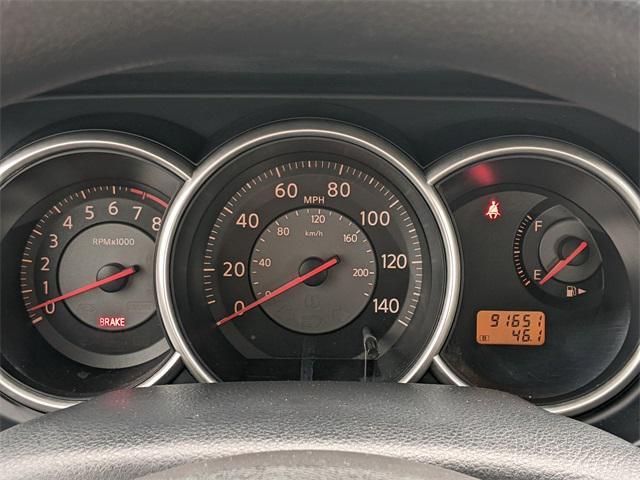 used 2009 Nissan Versa car, priced at $6,000