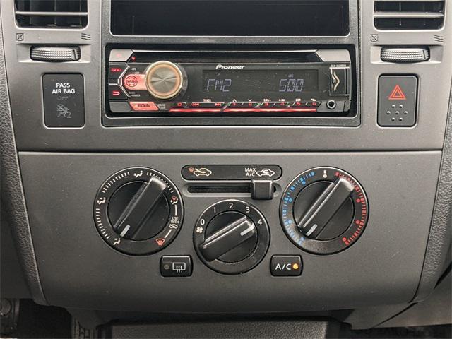 used 2009 Nissan Versa car, priced at $6,000