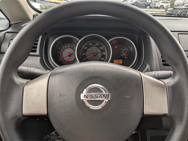 used 2009 Nissan Versa car, priced at $6,000