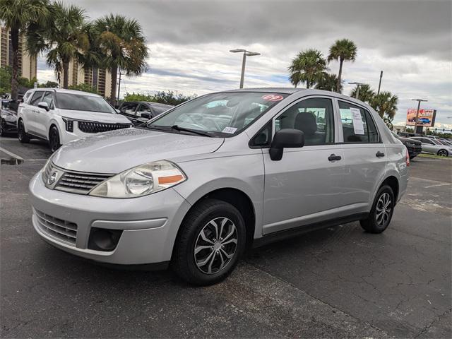 used 2009 Nissan Versa car, priced at $6,000