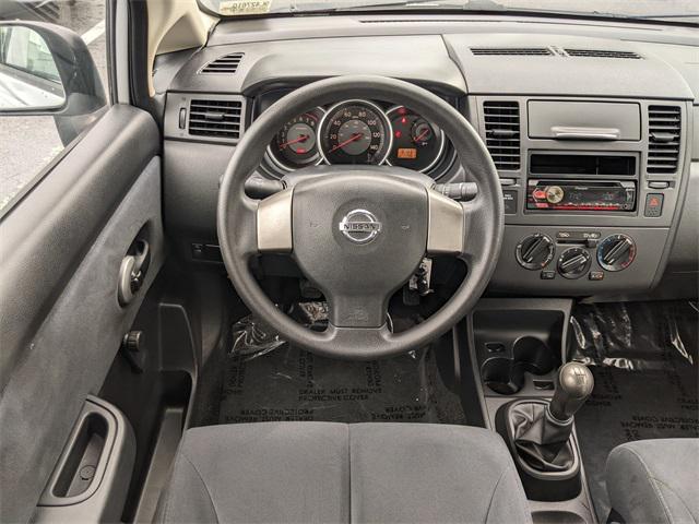 used 2009 Nissan Versa car, priced at $6,000