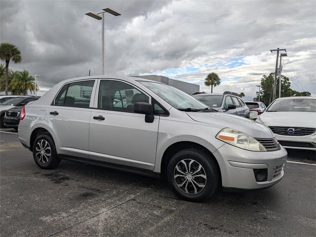 used 2009 Nissan Versa car, priced at $6,000