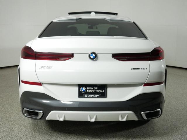 used 2025 BMW X6 car, priced at $77,225