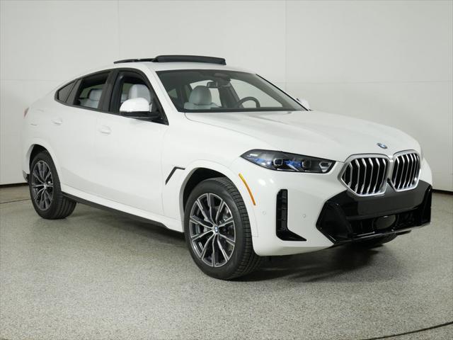 used 2025 BMW X6 car, priced at $77,225