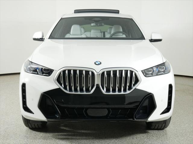 used 2025 BMW X6 car, priced at $77,225