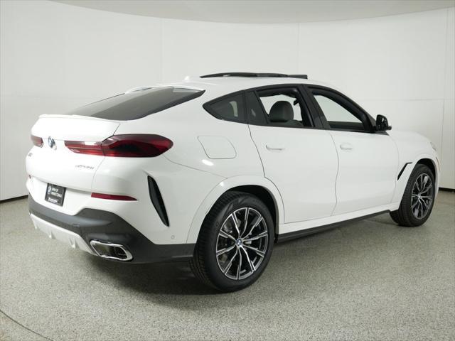 used 2025 BMW X6 car, priced at $77,225