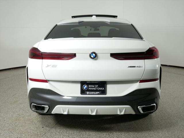 used 2025 BMW X6 car, priced at $77,225