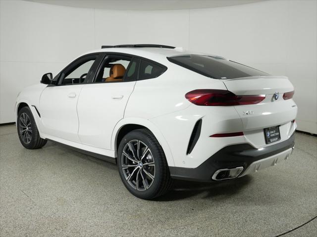 used 2025 BMW X6 car, priced at $77,225