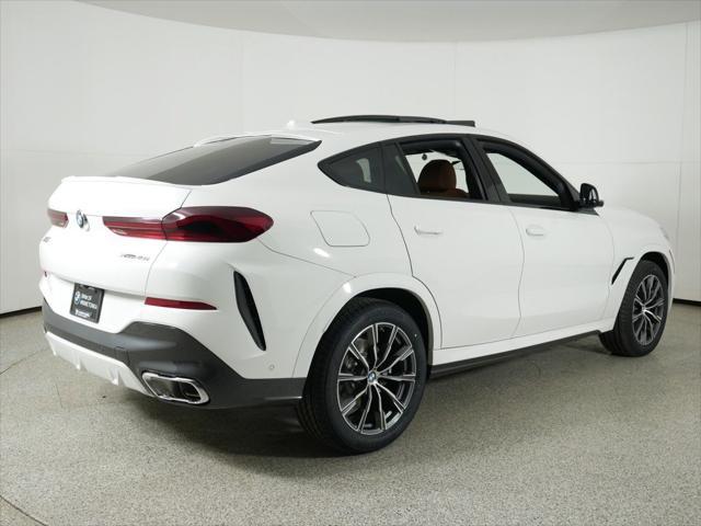 used 2025 BMW X6 car, priced at $77,225