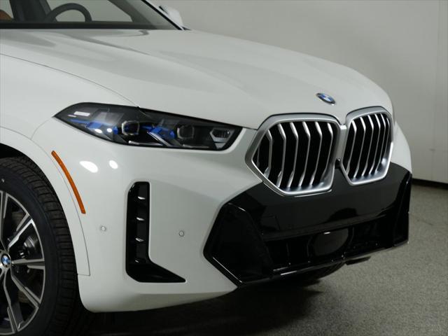 used 2025 BMW X6 car, priced at $77,225