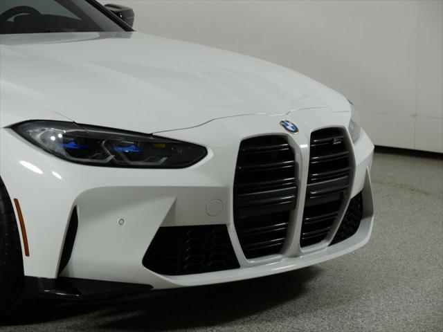 used 2021 BMW M4 car, priced at $64,000